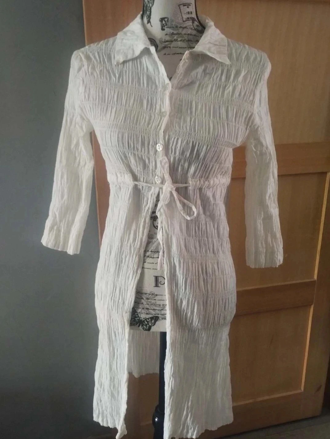 Long gilet fin , crème, Eva Tralala T38
Crème